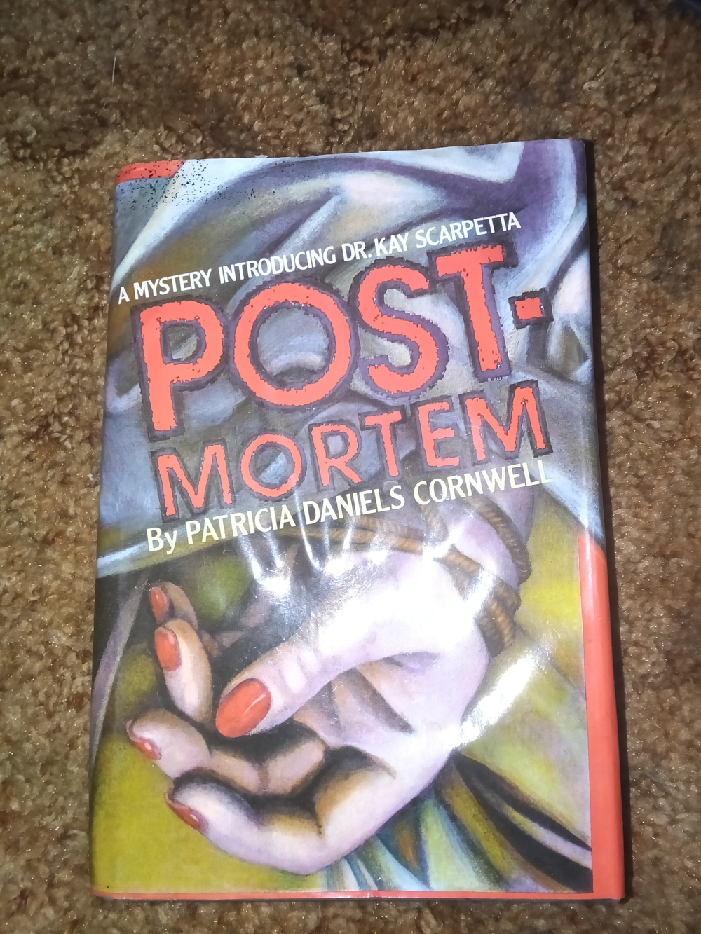 Postmortem Hardcover Book - - Orange Accents
